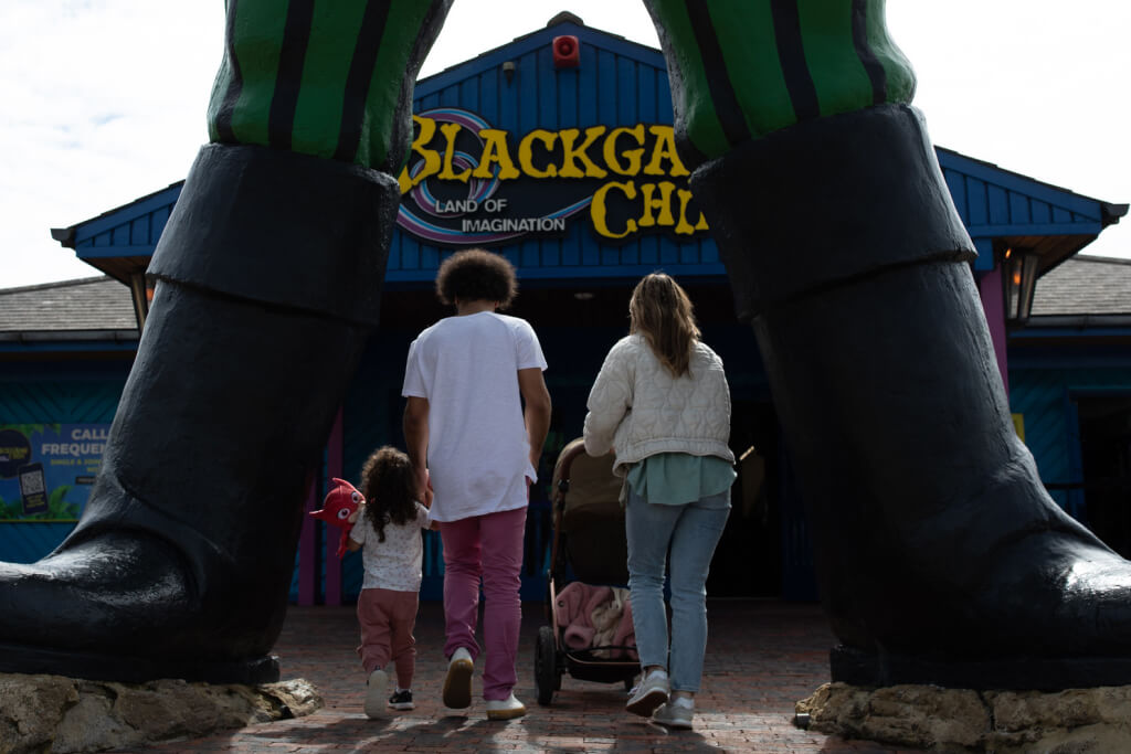 Photo of a family going into a pier